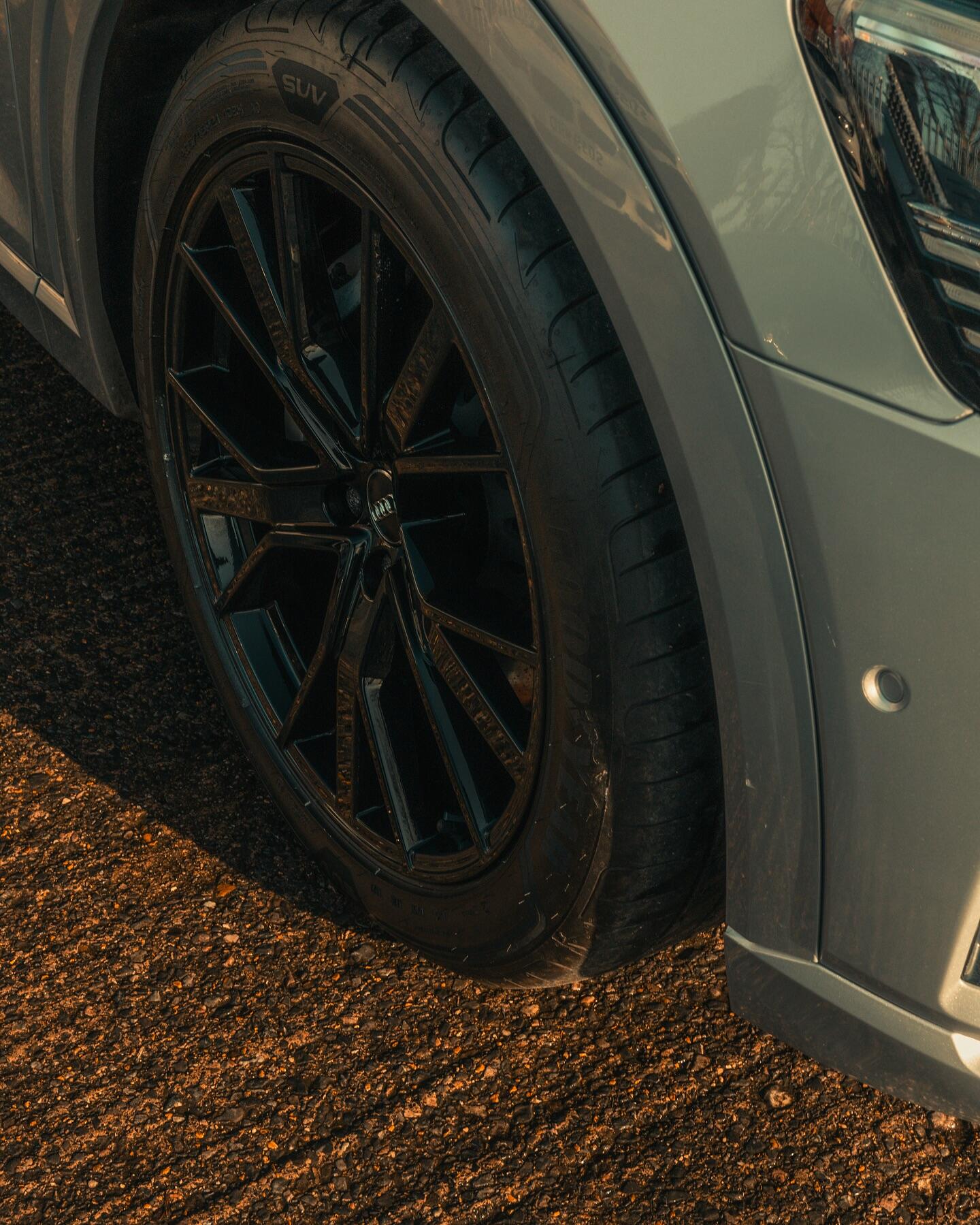 Audi SUV with custom black alloy wheel finish