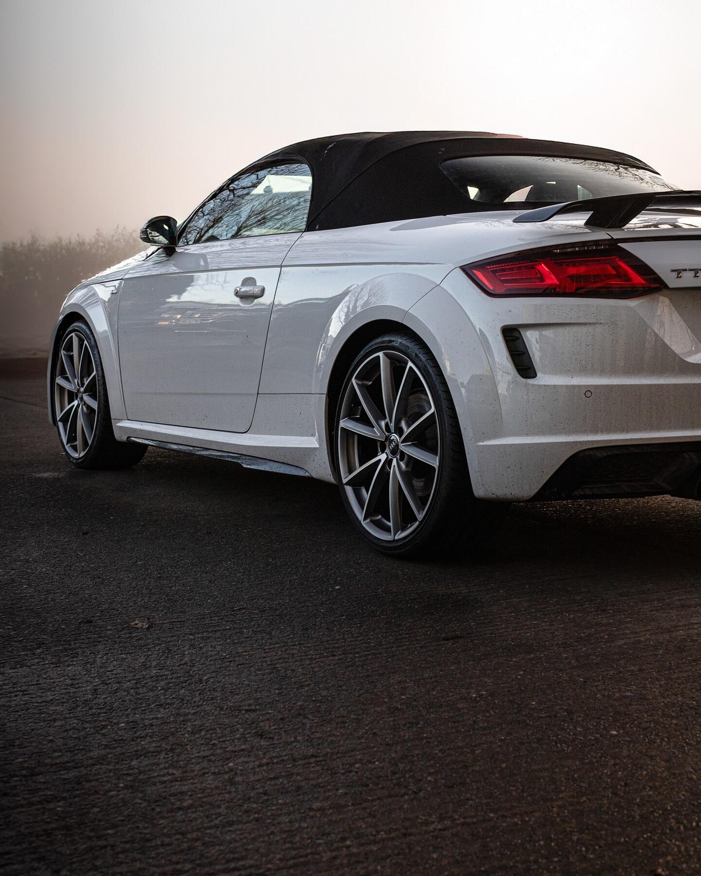 Audi TT rear view at sunset with refurbished wheels