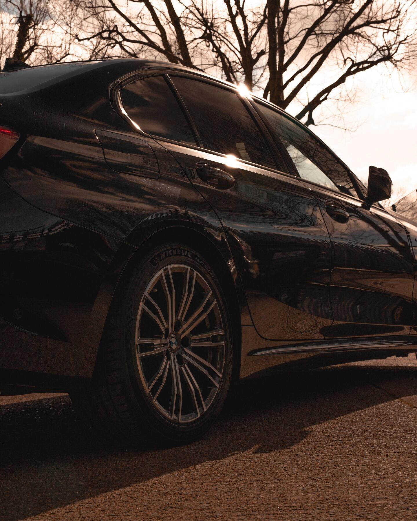 BMW black rear alloy wheel after custom finish
