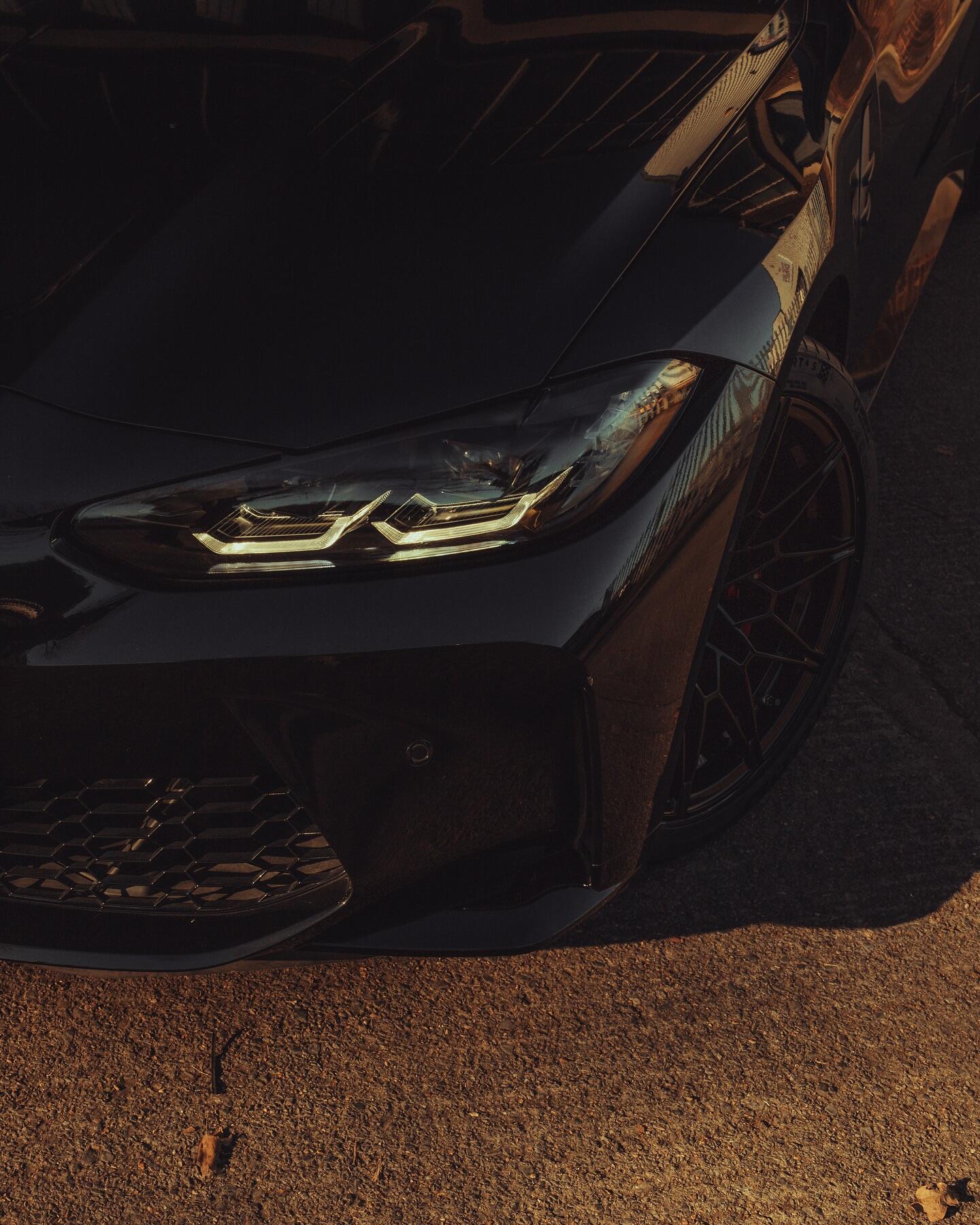 BMW front headlight and wheel close-up