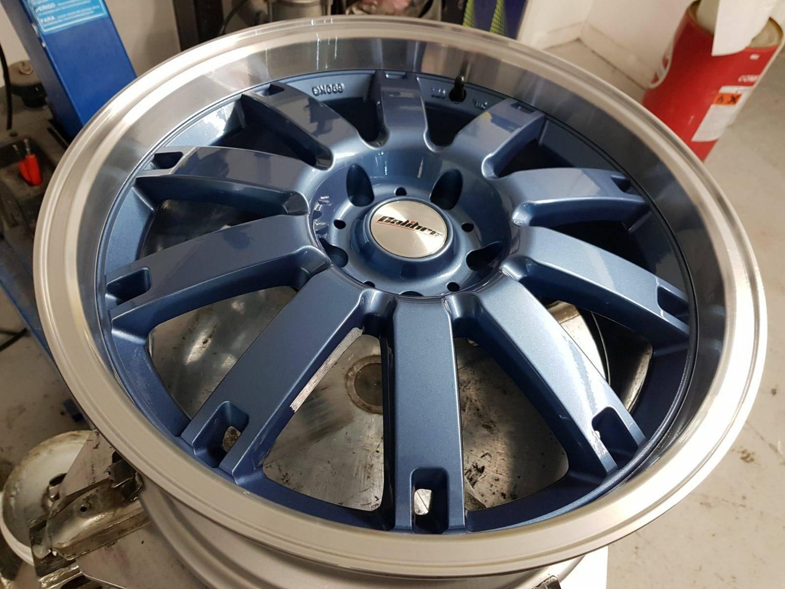 Calibre alloy wheel with custom blue painted finish by South West Alloys