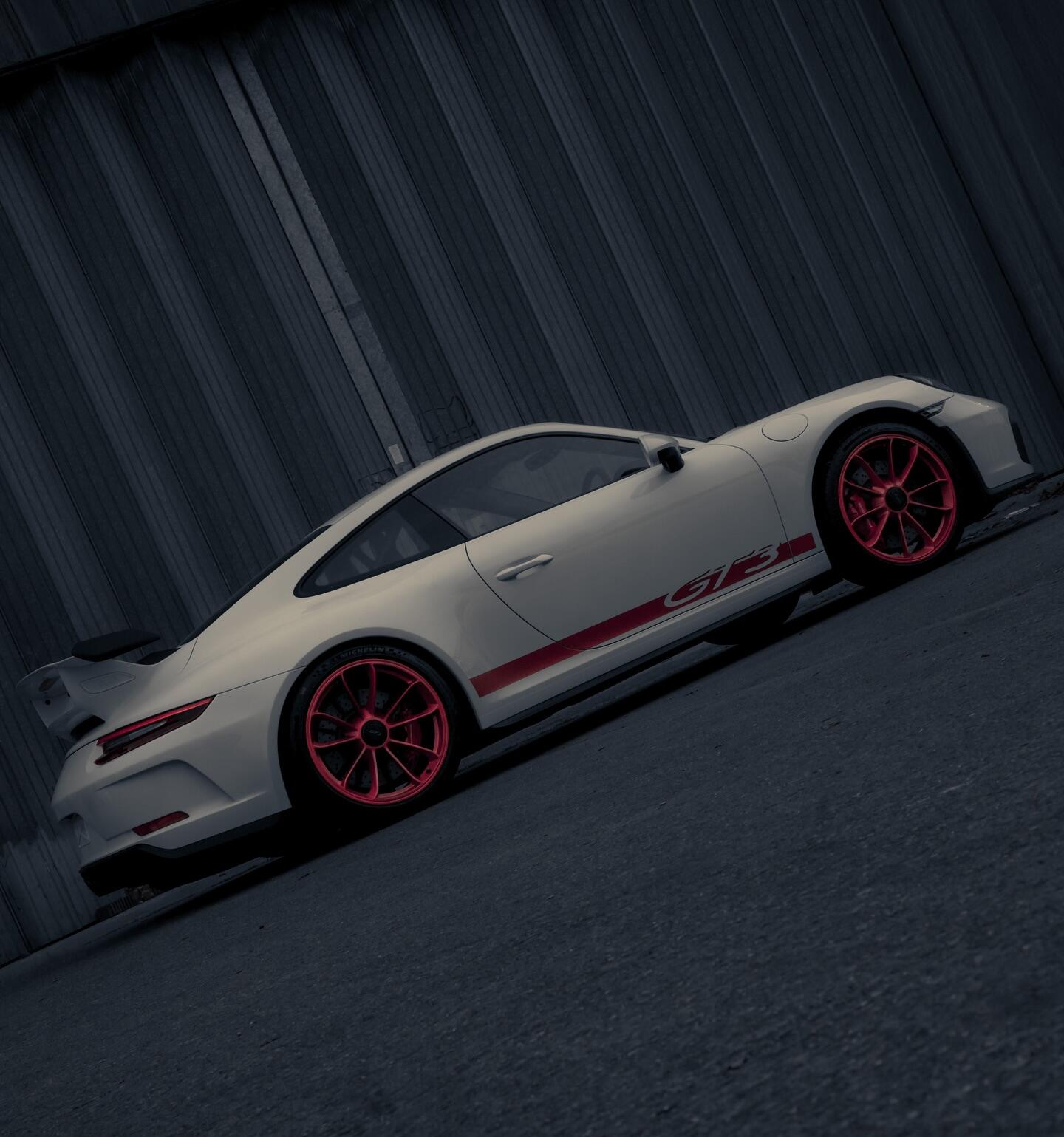 Porsche 911 GT3 side view showing refurbished wheels