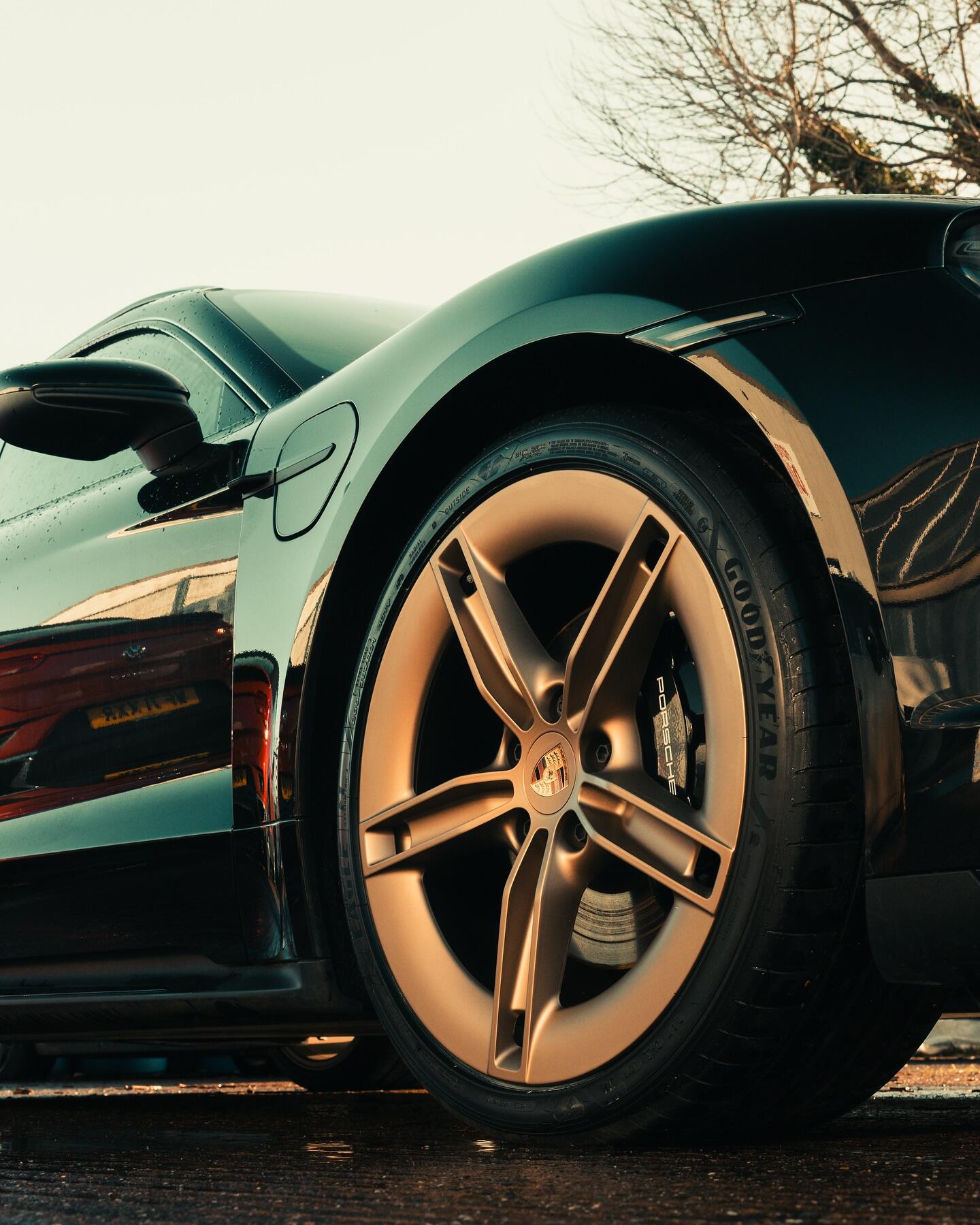 Porsche Taycan gold alloy wheel custom finish