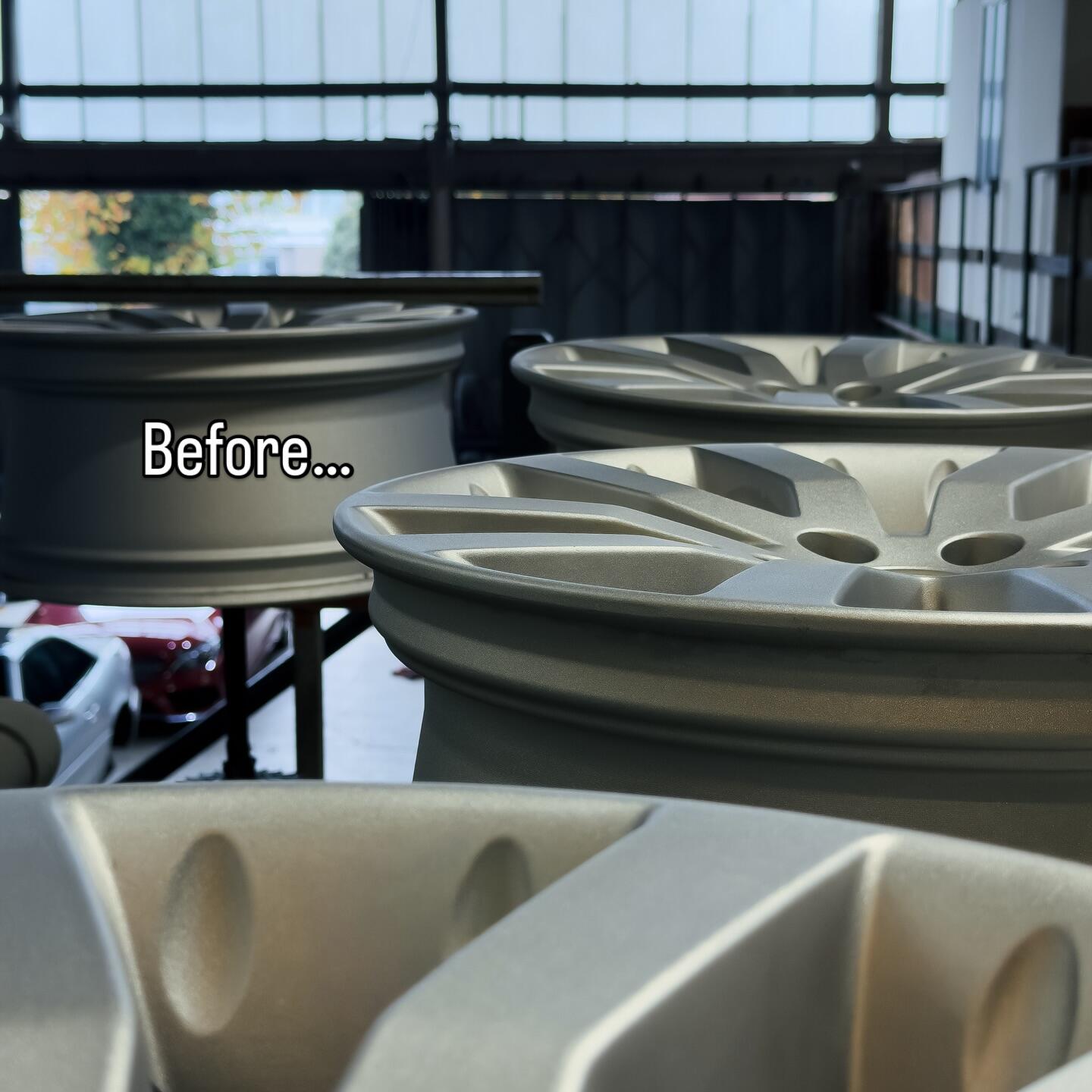 Set of alloy wheels before refurbishment showing corrosion and damage